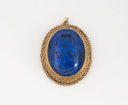 Yellow gold (750) pendant with a lapis lazuli...