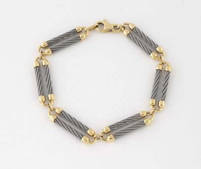 FRED Force 10
Steel and yellow gold bracelet...