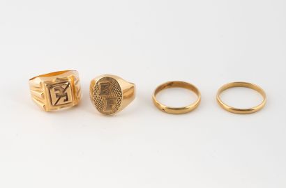 Set of wedding rings and signet ring in yellow...