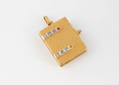 Yellow gold (750) book-shaped pendant adorned...