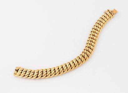 Hollow American link bracelet in yellow gold...