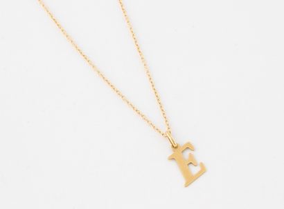 Yellow gold (750) forçat link necklace holding...