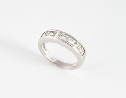 Half-American wedding band in white gold...