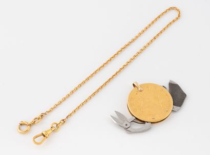 Round pendant adorned on each side with a...