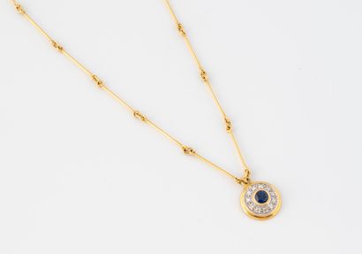 Yellow gold (750) stick-set necklace centered...