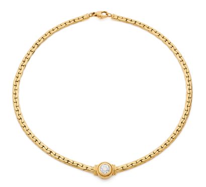 Necklace in yellow gold (750) with flattened...
