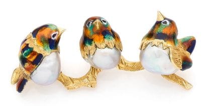 Yellow gold (750) brooch with a design of...
