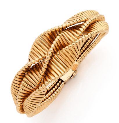 Yellow gold (750) bracelet formed of three...