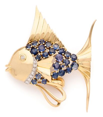 Fish brooch in yellow gold (750) and platinum...