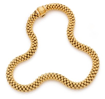 Necklace in yellow gold (750) with round...