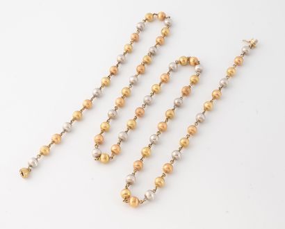 Three-gold (750) textured beads sautoir necklace....