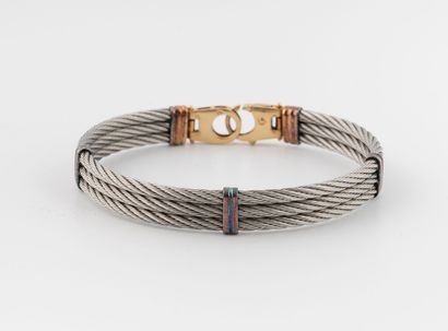 Three-strand steel wire bracelet.
Lobster...