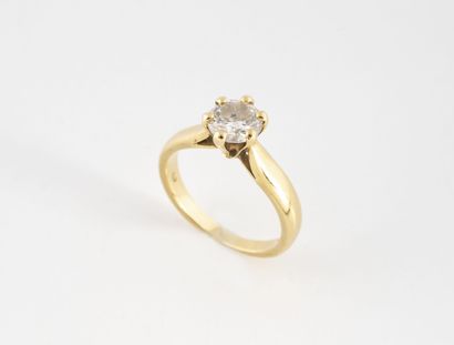 Solitaire ring in yellow gold (750) set with...