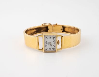 OMEGA
Ladies' wristwatch in yellow gold (750).
Rectangular...