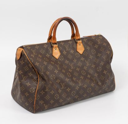 Louis VUITTON
Sac modèle Speedy en toile...