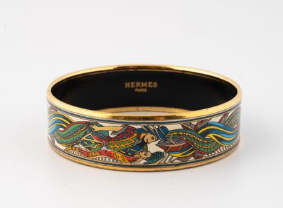 HERMES Paris
Bracelet jonc en métal doré...