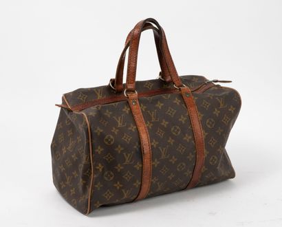 LOUIS VUITTON
Sac de voyage souple en toile...