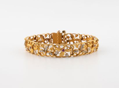 Articulated openwork bracelet in yellow and...