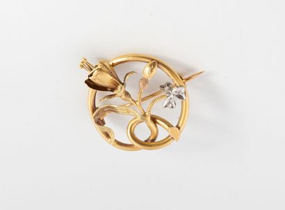 Round openwork brooch in (750) yellow and...
