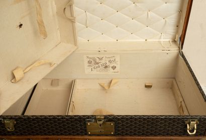GOYARD
Malle de voyage en bois gainé de toile...