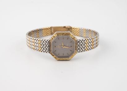 OMEGA
Ladies' wristwatch in steel and gold-plated...