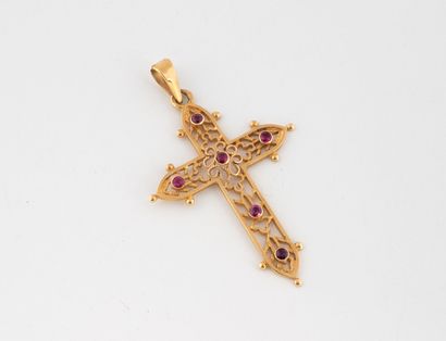 Small openwork cross pendant in yellow gold...