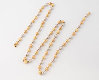Three-gold (750) textured beads sautoir necklace....