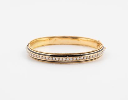 Openwork yellow gold (750) bangle bracelet...