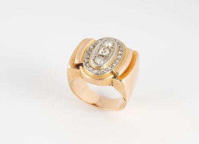 Yellow gold (750) ring with oval top paved...