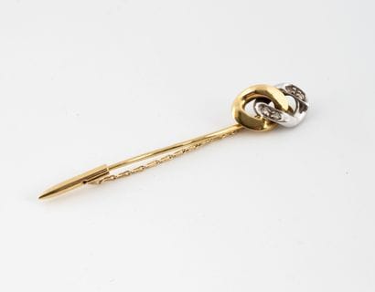 Yellow and white gold (750) collar pin with...