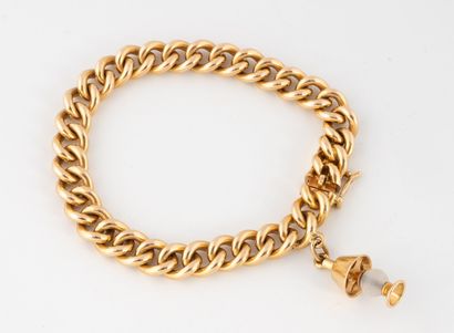 Bracelet gourmette en or jaune (750) retenant...