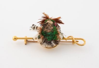Yellow gold (750) filin brooch imitating...