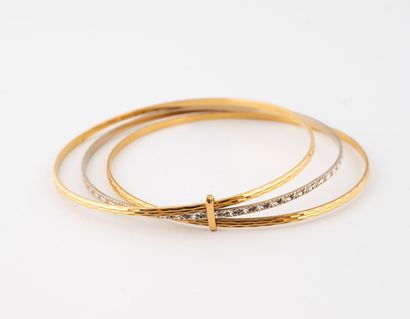 Bracelet composé de trois jonc en ors (750)...