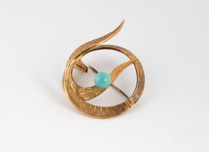 Brooch in yellow gold (750) forming a ribbon...
