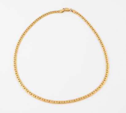 Flat gourmette link necklace in yellow gold...