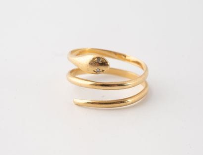Yellow gold (750) snake ring in the form...