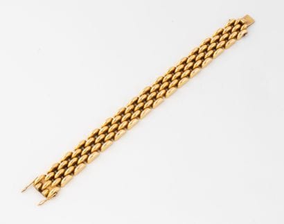 Articulated bracelet in yellow gold (750)...