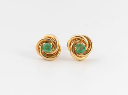 Pair of yellow gold (750) stud earrings in...