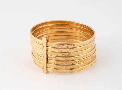 Semainier bracelet in yellow gold (750) with...