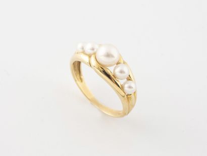 Yellow gold (750) ring set with a line of...