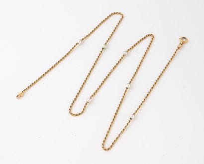 Yellow gold (750) twisted link necklace punctuated...