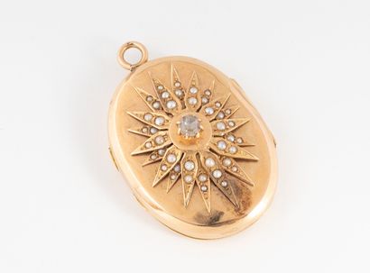 Pink gold (750) oval photo pendant.
Adorned...