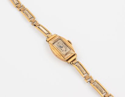 Ladies' wristwatch. 
 Yellow gold (750) tonneau...