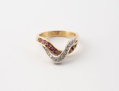 Yellow and white gold (585) ring in the form...