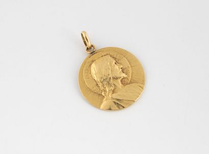 Une médaille ronde figurant le Christ en...
