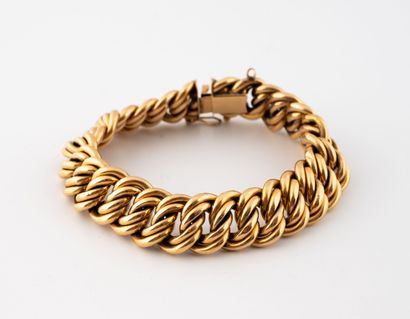 Bracelet gourmette en or jaune (750) à maille...