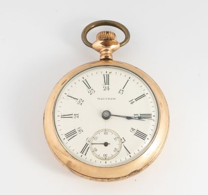 WALTHAM
Gilt metal pocket watch.
Back cover...