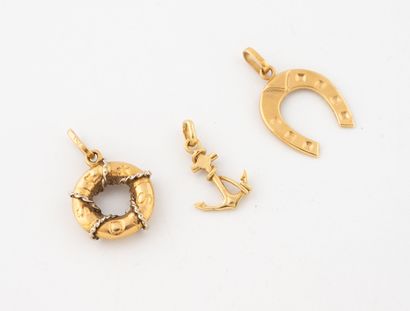 Set of anchor, horseshoe and buoy pendants...