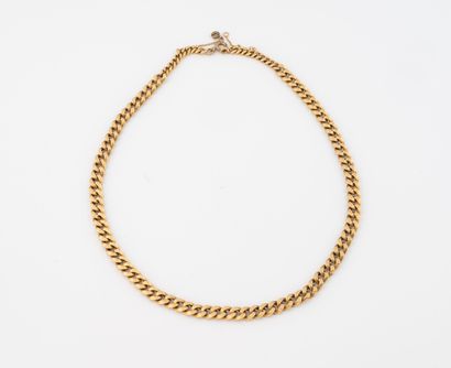 Collier maille gourmette en or jaune (750)....