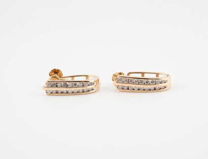 Pair of elongated Creole-shaped ear clips...